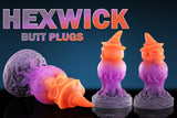 Close-up of the witch hat, skull and pumpkin lantern details on the Swisok Hexwick Halloween butt plug.