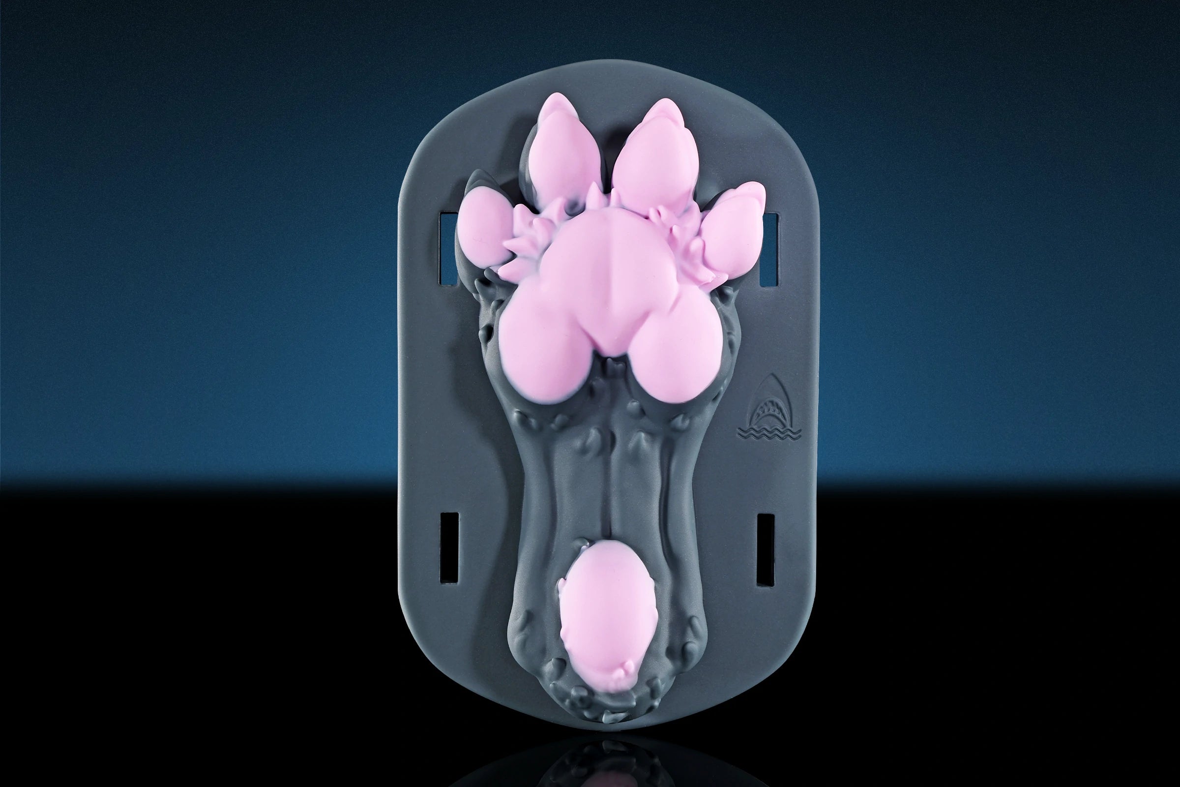 Swisok Paw Pleaser grinder sex toy – soft pink puppy paw grinder for pup play. I love the warm, squishy grip and teasing tongue sliding against me as I thrust into this grinding sex toy during my puppy play sessions.